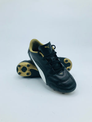 Puma King Hero FG - Black/White/Gold